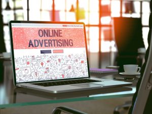 Online Advertising Concept. Closeup Landing Page on Laptop Screen in Doodle Design Style. On Background of Comfortable Working Place in Modern Office. Blurred Toned Image. 3D Render. - Four Networking Event Ideas That Will Get Everyone Talking